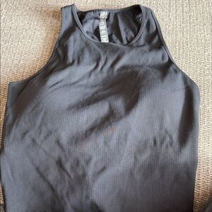 Vuori black workout tank with built in bra.  XL